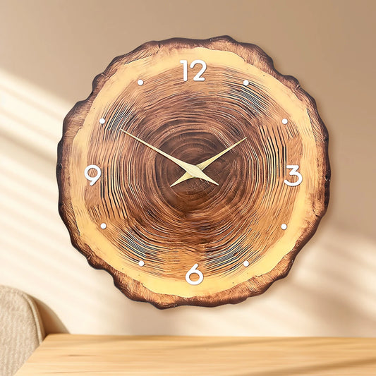Wooden wall clock with tree ring design on a beige background