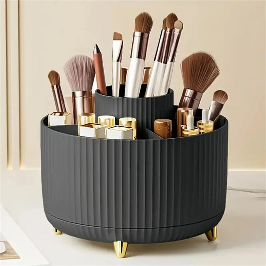 Black cylindrical makeup organizer with brushes and containers on a light background