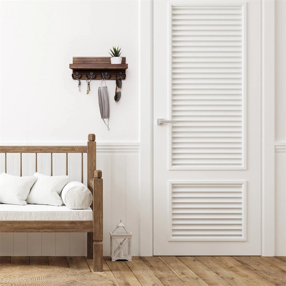 Wooden bed with white bedding in a room with a white radiator on the wall.