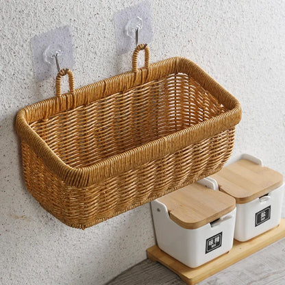Woven basket hanging on a wall with storage containers below