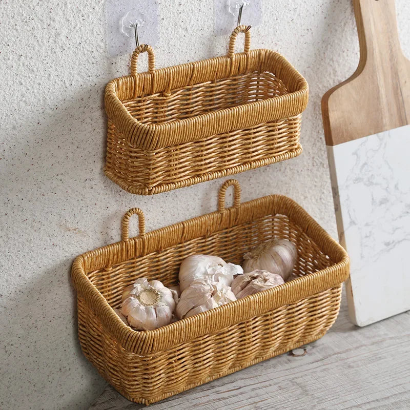 Two wicker wall baskets hanging on a textured wall with a neutral background.