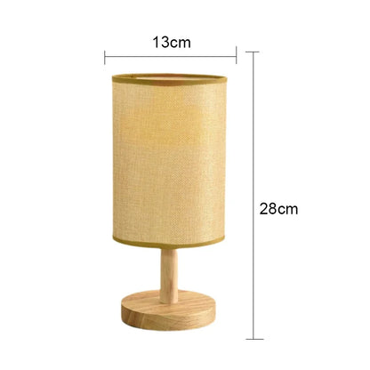Table lamp with dimensions indicated on a white background
